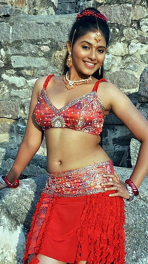 Woman in Traditional Red Ethnic Outfit with Gold Jewelry and Stone Background, Anjali, tamil actress, navel HD phone wallpaper
