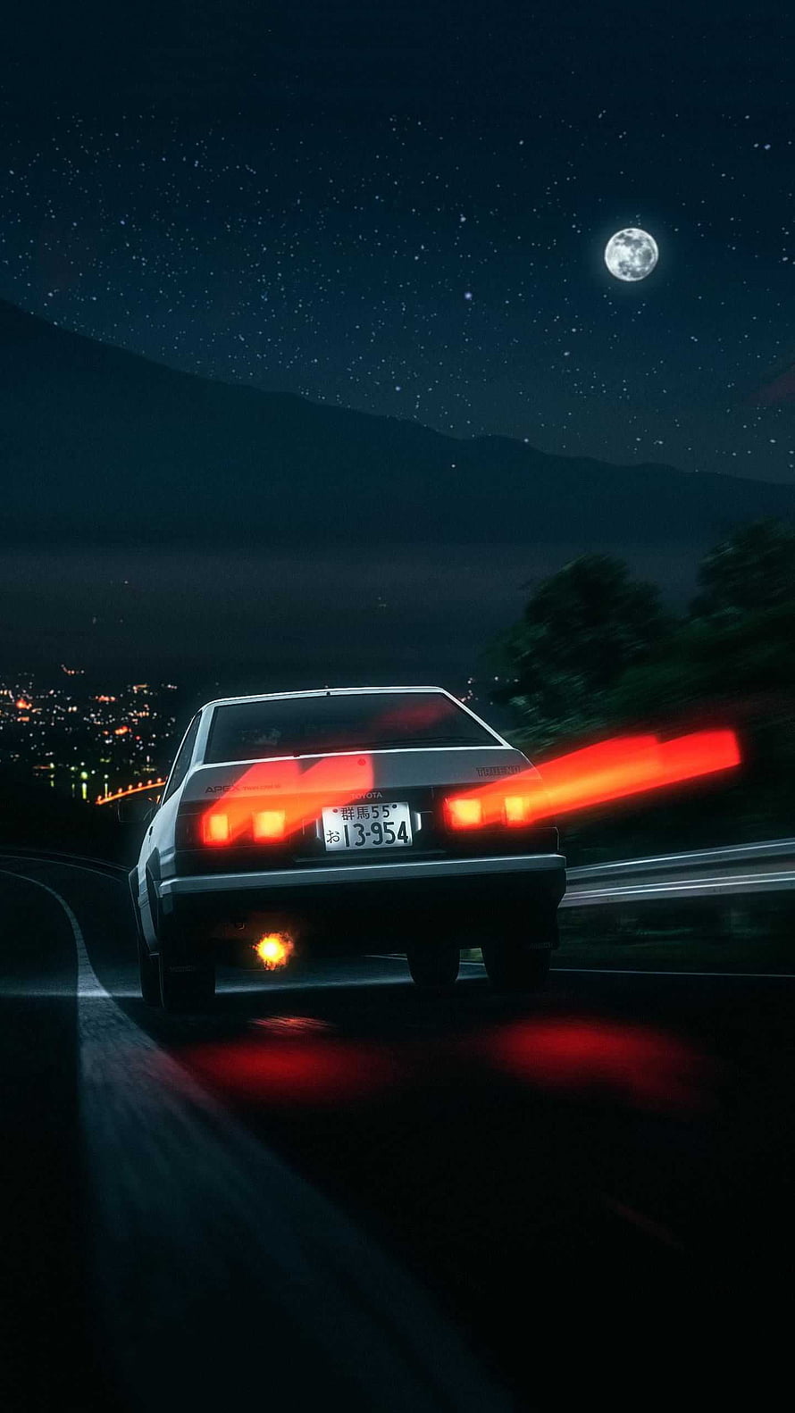 Toyota AE86 Trueno drifting on a winding mountain road at night under a full moon with city lights HD phone wallpaper