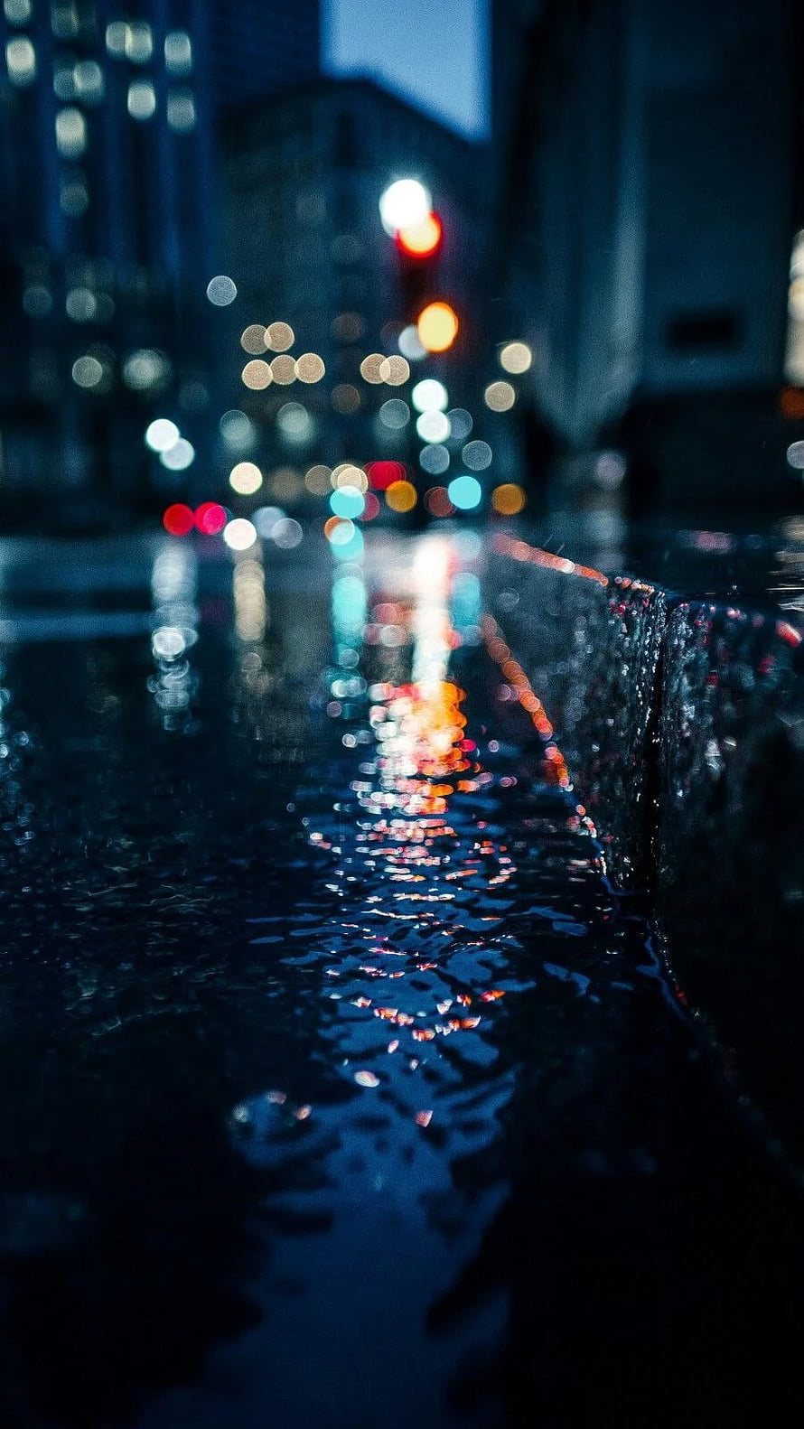 Moody Night Cityscape with Bokeh Lights Reflecting on Wet Pavement HD phone wallpaper