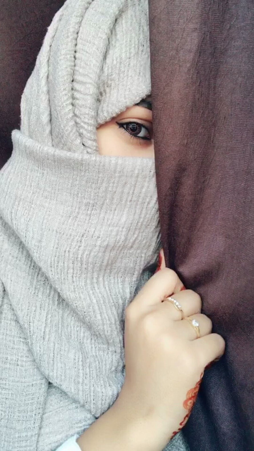 Close-up portrait of a woman in a grey knitted hijab and niqab with henna hand, Miss Khan on Hijab dpz. Girl hijab, Niqab HD phone wallpaper