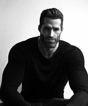 Black and white studio portrait of a muscular man with a beard wearing a dark long-sleeve shirt, Giga Chad ideas. chad, memes, muscle men HD phone wallpaper