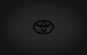 Sleek Toyota Logo on Dark Carbon Fiber Texture Background HD wallpaper