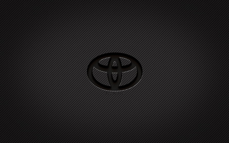 Sleek Toyota Logo on Dark Carbon Fiber Texture Background HD wallpaper