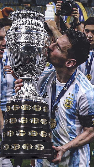 Lionel Messi Kissing The Copa America Trophy In Argentina Jersey HD phone wallpaper