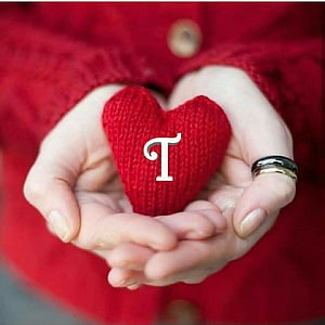Cute Knitted Red Heart Held in Hands with Letter T Initial for Profile Picture HD phone wallpaper