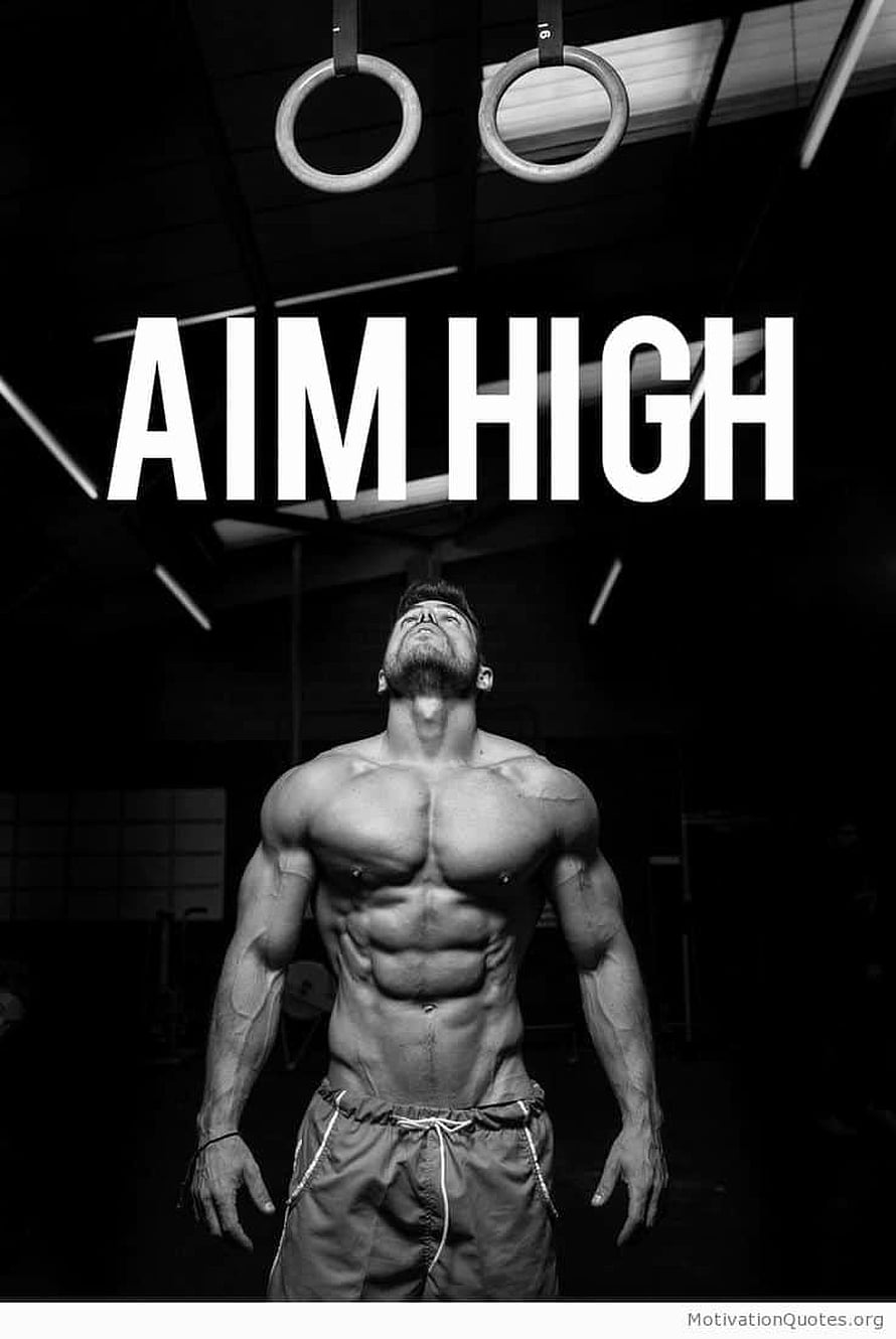 Motivational Gym Poster Featuring Muscular Athlete Looking Up at Gymnastic Rings HD phone wallpaper