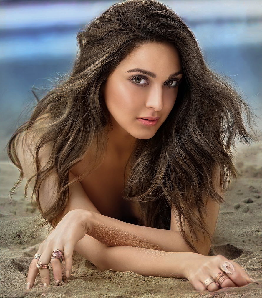 Kiara Advani Lying On Sandy Beach With Wavy Hair And Rings HD phone wallpaper
