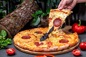 Pepperoni Pizza With Melted Cheese On Wooden Board HD wallpaper