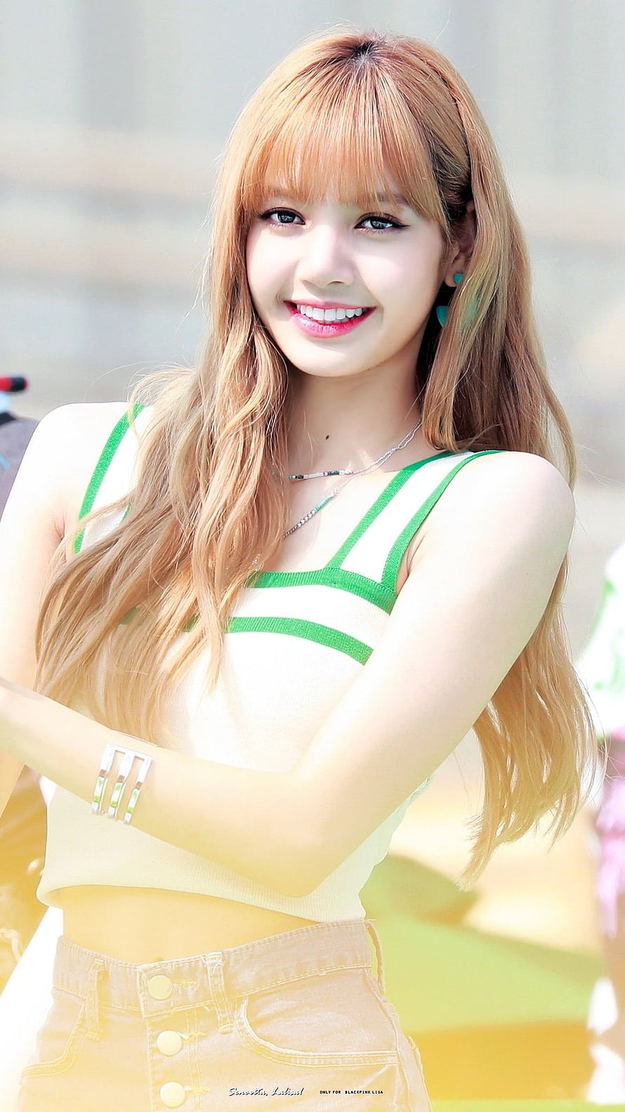 Lisa from Blackpink in a cream and green striped top with long blonde hair HD phone wallpaper