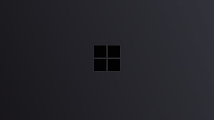 Minimalist Microsoft Windows Logo on Dark Gray Background HD wallpaper