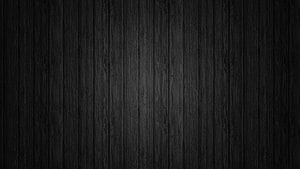 Dark Charcoal Wood Plank Texture with Vertical Grain Pattern HD wallpaper