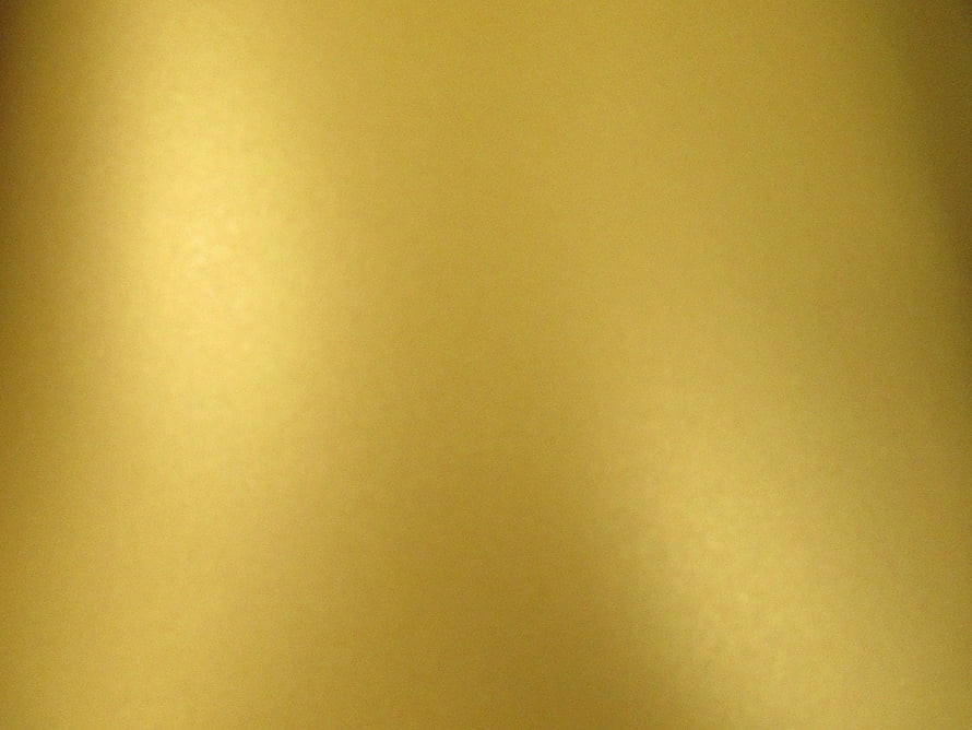 Aged Glowing Gold Foil Texture with Soft Gradient and Metallic Sheen HD wallpaper
