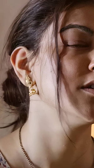 Kajal Agarwal Close-Up Portrait With Gold Earring And Soft Lighting HD phone wallpaper