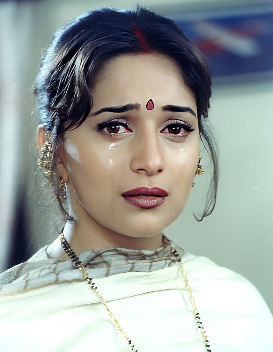 Madhuri Dixit in a vintage Bollywood portrait with traditional Indian jewelry and a red bindi HD phone wallpaper