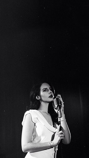 Eva Green Singing Into Vintage Microphone In Black And White Portrait HD phone wallpaper