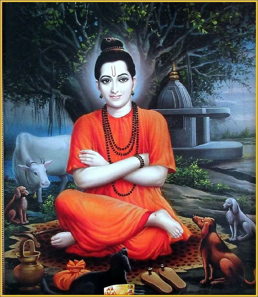 Sai Baba Portrait in Orange Robe with Dogs and Cow in Forest Setting HD phone wallpaper