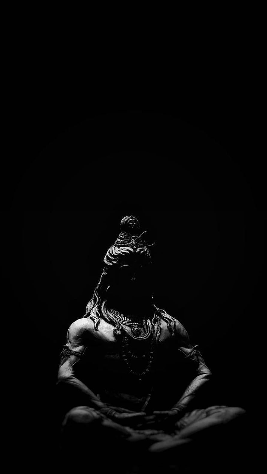 Dark Monochrome Statue of Meditating Hindu Deity in Shadow HD phone wallpaper