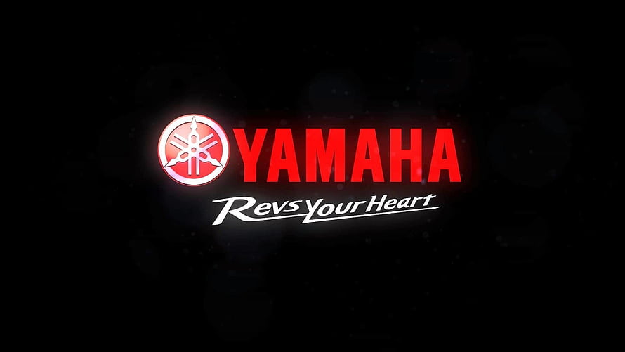 Yamaha Revs Your Heart Logo on Black Background HD wallpaper