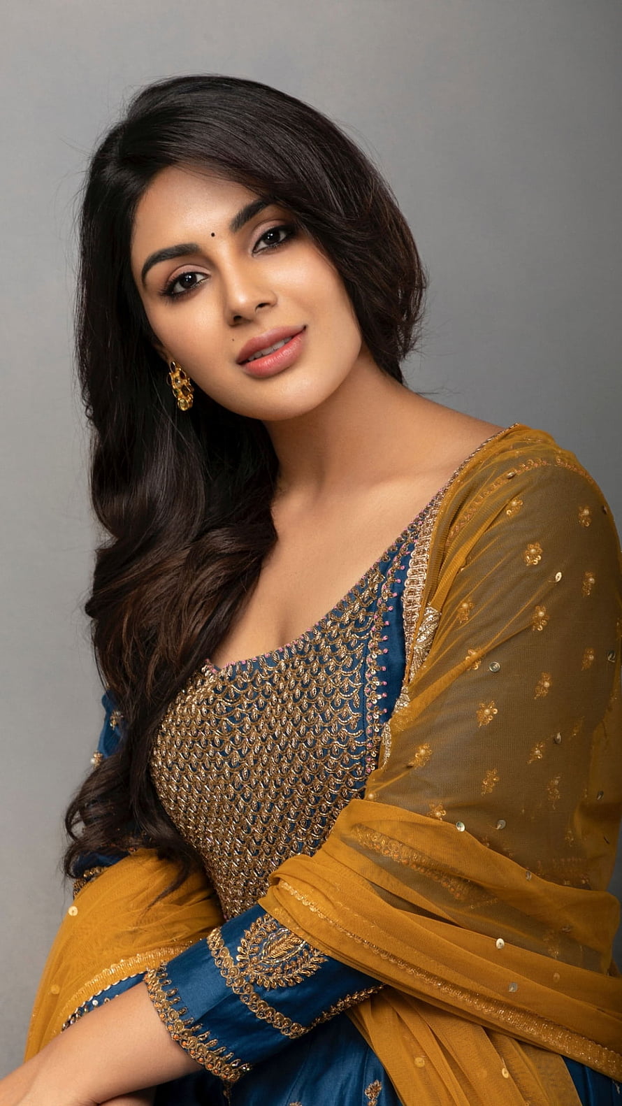Mrunal Thakur in a Blue and Gold Traditional Outfit Portrait HD phone wallpaper