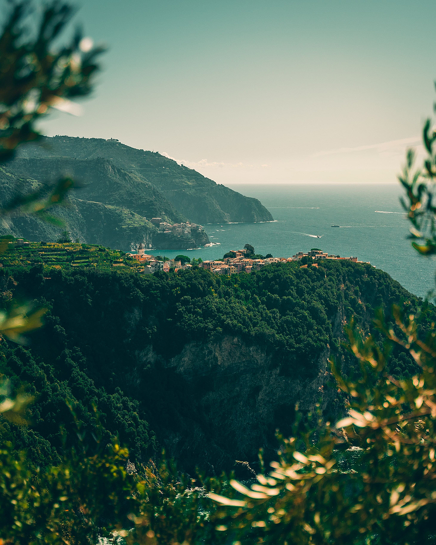 Coastal Cliffside Village Overlooking the Mediterranean Sea with Lush Green Hills HD phone wallpaper