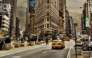 New York City Street Scene With Yellow Taxis And Historic Architecture HD wallpaper