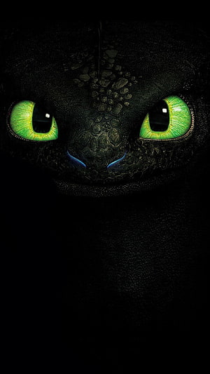 Toothless Night Fury Close-Up with Glowing Green Eyes in Darkness HD phone wallpaper