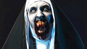 Valak The Nun Horror Character with Blood-Soaked Fangs and Terrifying Expression HD wallpaper