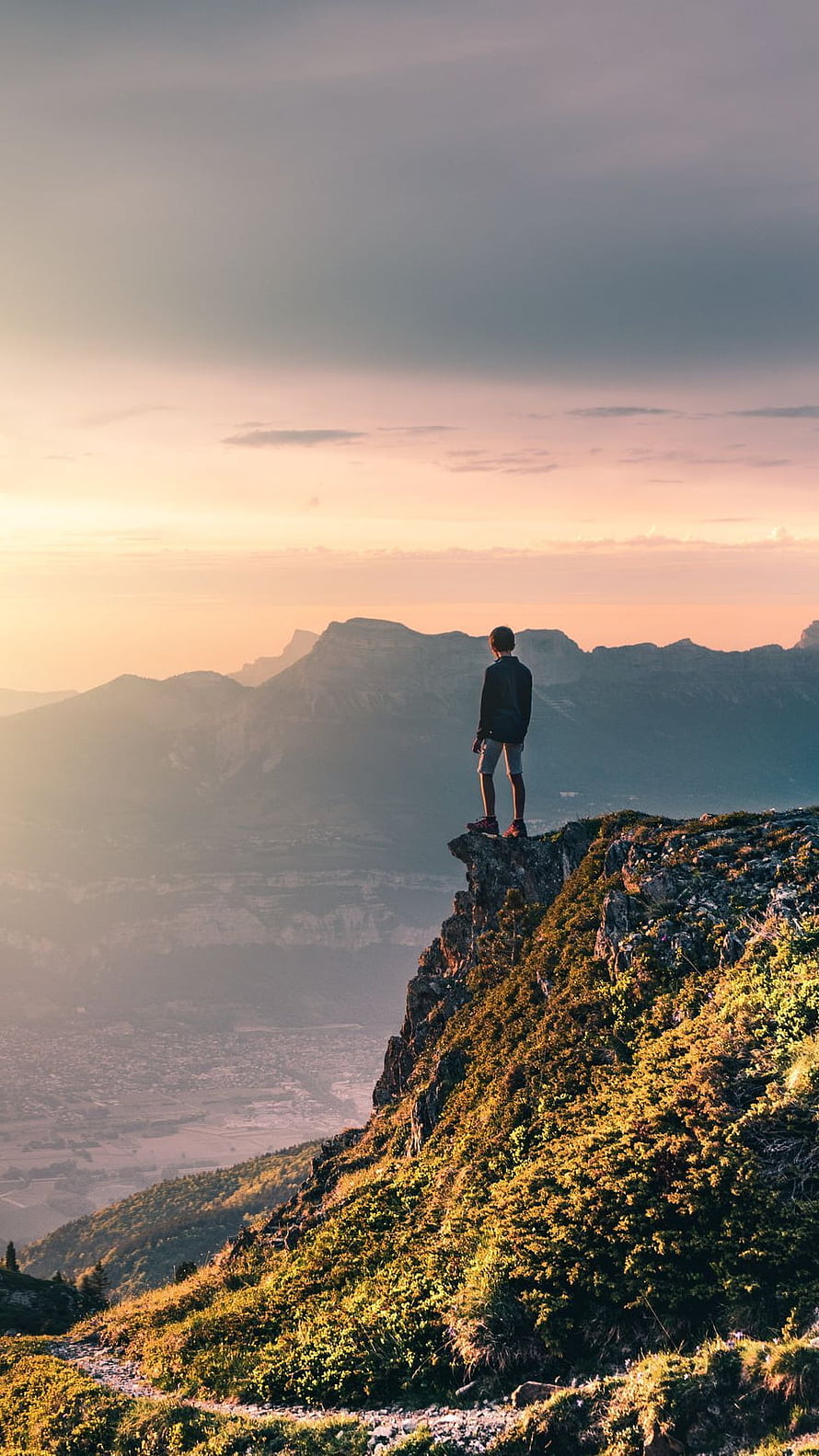 Man Standing on Cliff Edge Overlooking Mountain Valley at Sunset, Alone, Boy, Sad Life HD phone wallpaper