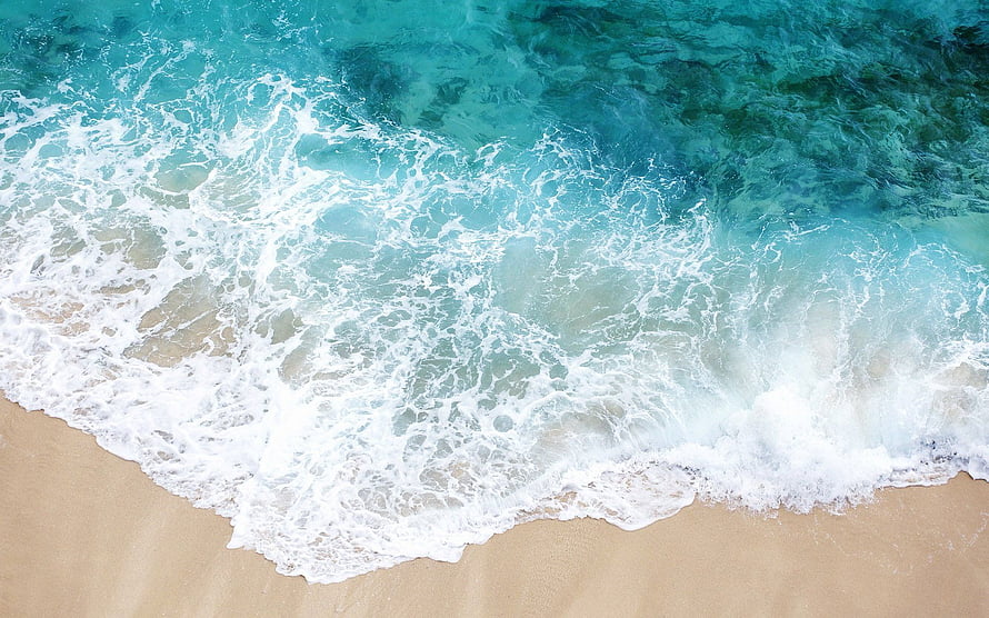 Aerial View of Turquoise Ocean Waves Crashing on Sandy Shore HD wallpaper