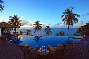 Luxury Tropical Villa with Infinity Pool Overlooking the Ocean at Dusk HD wallpaper