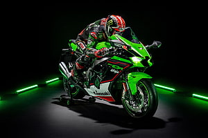 Kawasaki Ninja ZX-10R Superbike with Rider in Green and Black Livery HD wallpaper