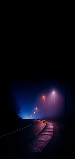Misty Night Road With Glowing Street Lamps And Foggy Atmosphere HD phone wallpaper