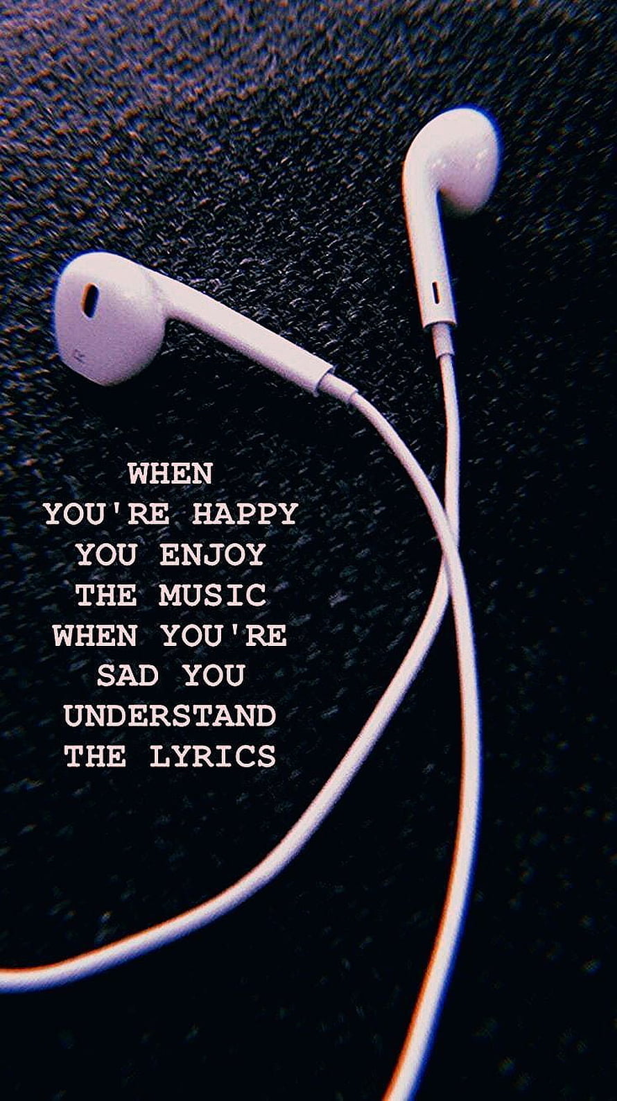 White Wired Earbuds on Dark Textured Surface with Motivational Music Quote HD phone wallpaper
