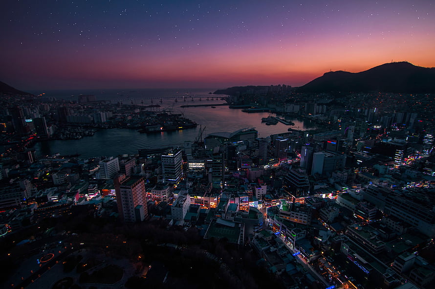 Aerial View of Busan Harbor at Twilight with Starry Sky and City Lights HD wallpaper