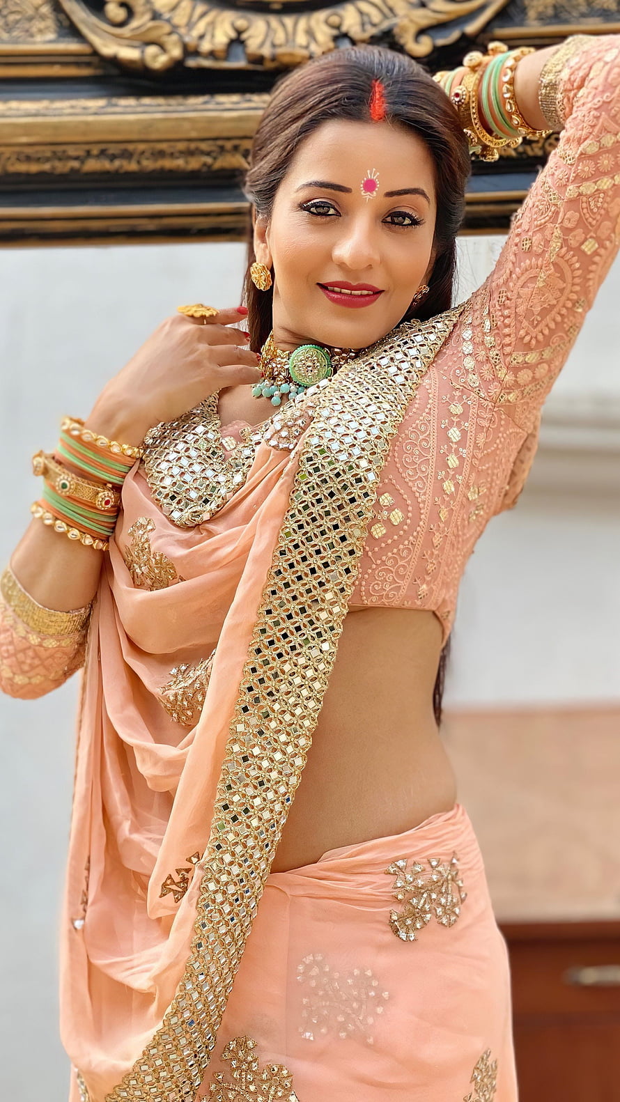 Monalisa in Elegant Peach Saree with Gold Mirror Work and Traditional Jewelry HD phone wallpaper