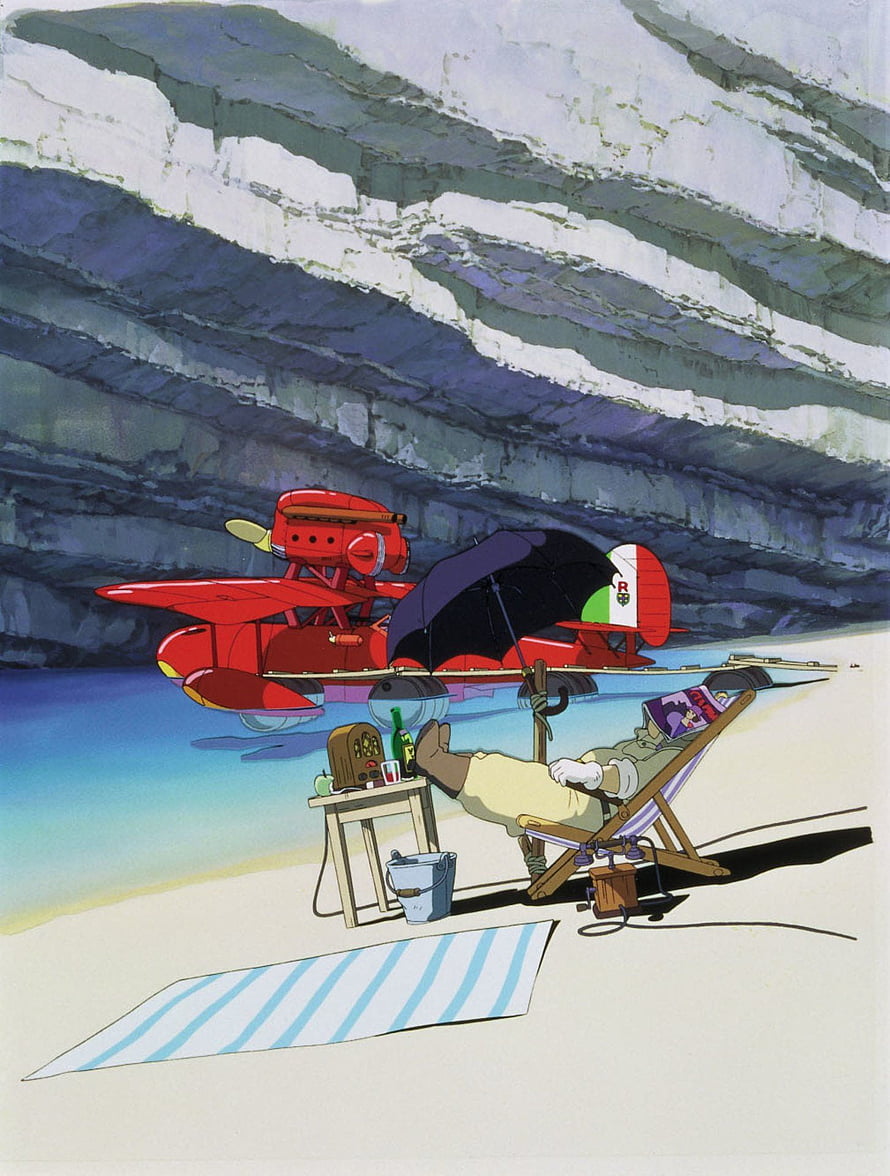 Porco Rosso relaxing on a beach beside his red seaplane under a striped cliff HD phone wallpaper