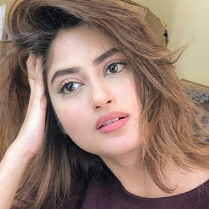 Sajal Aly Close-Up Portrait With Messy Brown Hair And Soft Natural Makeup HD phone wallpaper