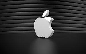 Sleek 3D Apple Logo on Dark Ribbed Background HD wallpaper