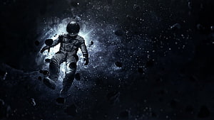 Floating Astronaut Drifting Through Dark Space With Asteroids and Starlight HD wallpaper