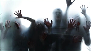 Horror Scene of Zombies Pressing Against a Foggy Window with Blood Stains HD wallpaper