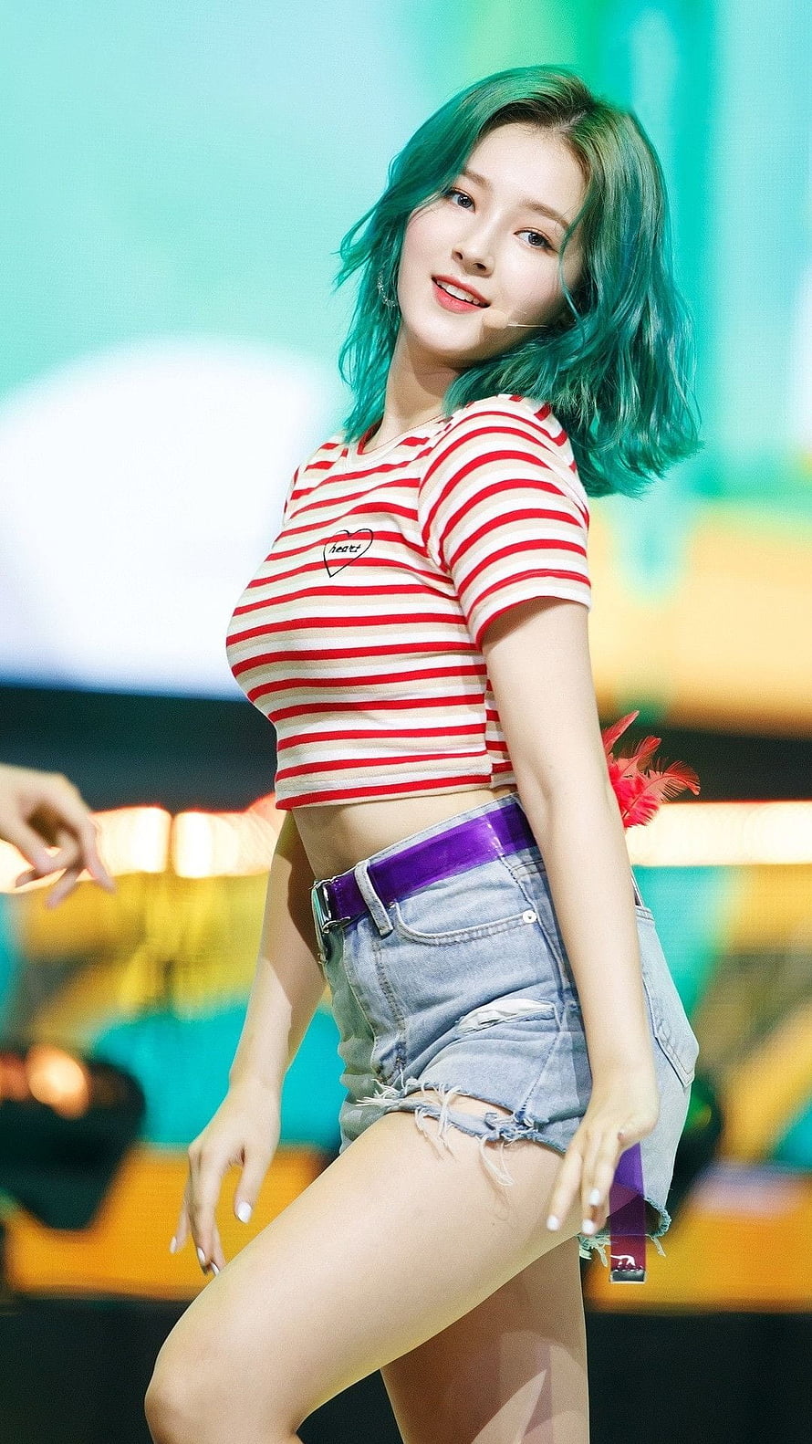 nancy from momoland performing on stage with green hair and striped crop top HD phone wallpaper