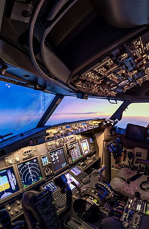 Boeing 737 Cockpit Interior at Sunset with Digital Flight Instruments and Control Panels HD phone wallpaper