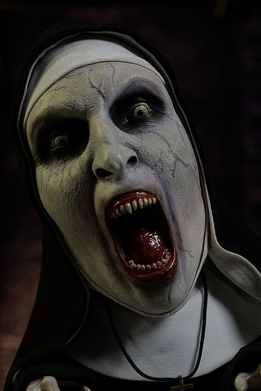 The Nun Horror Character with Pale Face and Open Mouth in Dark Setting HD phone wallpaper