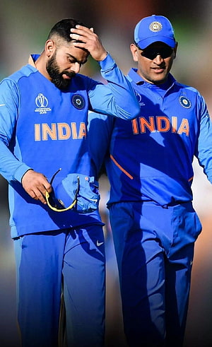Virat Kohli and MS Dhoni in India Cricket Team Blue Jerseys Walking Together HD phone wallpaper