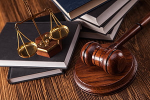 Wooden Gavel and Scales of Justice on Law Books HD wallpaper