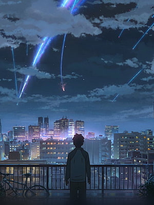 Anime Boy Watching Meteor Shower Over City Skyline at Night HD phone wallpaper