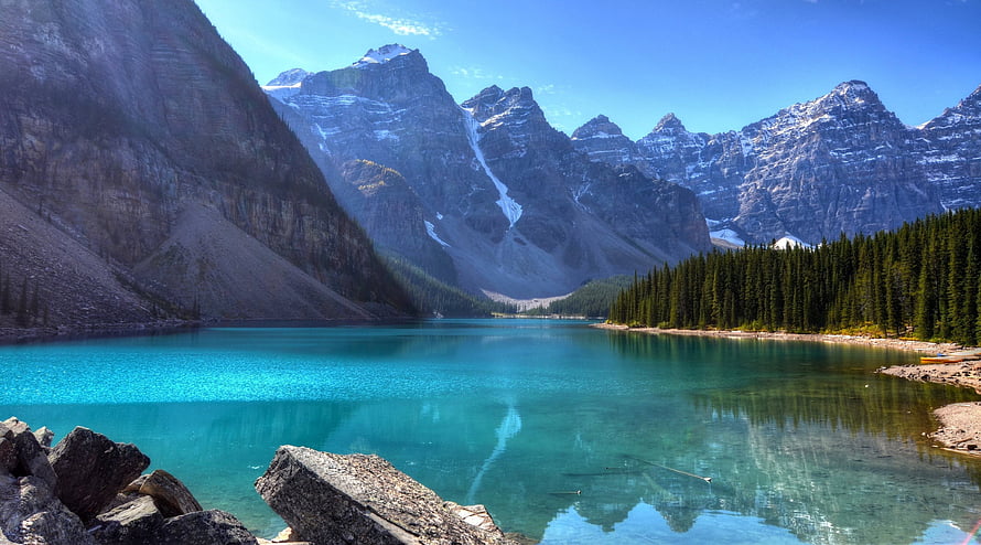 Moraine Lake Turquoise Waters Surrounded By Rocky Mountain Peaks And Pine Forest HD wallpaper