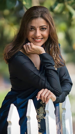 Kajal Aggarwal in a Blue Saree and Black Blouse Smiling Portrait HD phone wallpaper