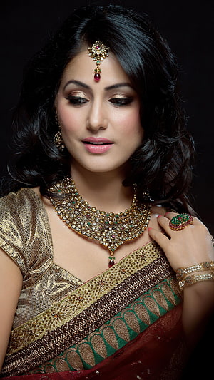 Hina Khan in Traditional Gold and Green Saree with Ornate Jewelry HD phone wallpaper