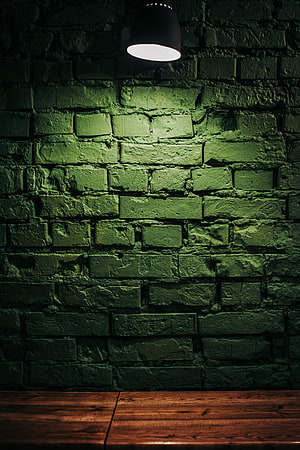Moody Green Brick Wall with Industrial Lamp and Wooden Floor HD phone wallpaper
